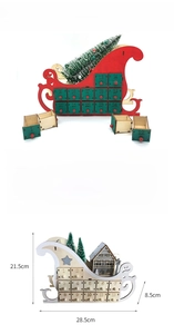 Detail view of wooden Christmas sled advent calendar with 24 numbered drawers