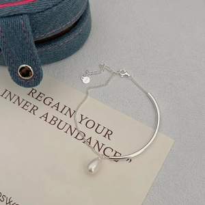 Minimalist S925 sterling silver pearl bracelet with a unique half-chain and bar design