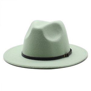 Detail view of mint green wool fedora hat with black leather band and gold buckle