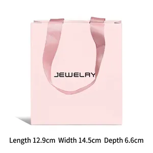 Pink jewelry gift bag with ribbon handles and dimensions 12.9 x 14.5 x 6.6 cm