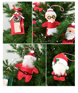 Detailed close-up of felt Santa and snowman ornaments with plush beards on a Christmas tree