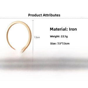 Detail view showing 7.5cm diameter and 22.1g weight for the golden geometric metal bangle