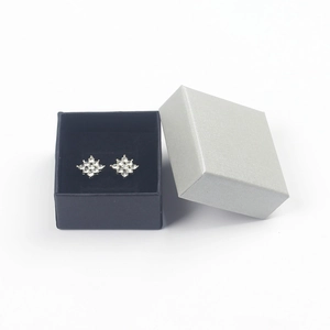 Silver flower earrings with sparkling crystals in a premium black jewelry gift box
