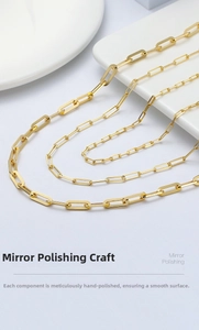 Close-up of three sizes of 14K gold plated paperclip chains with mirror polishing finish