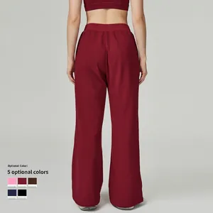 Women high-waisted loose fit sports sweatpants in burgundy with elastic waistband