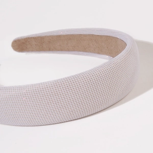 Sparkly white vintage wide headband with minimalist glitter finish on a clean white background