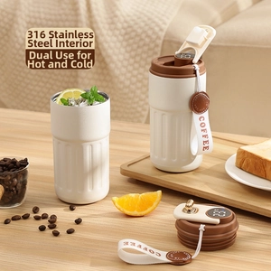 Close-up of smart coffee thermos with 316 stainless steel liner and LED temp display