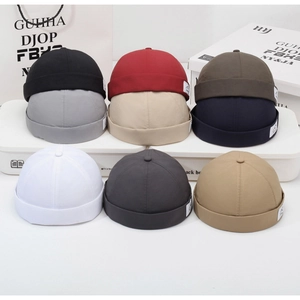 Collection of breathable docker caps in nine colors with detailed white embroidery side labels