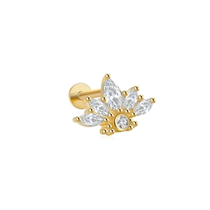 Macro detail of gold-plated flat back cartilage stud with marquise-cut zircons