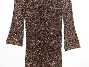 Close-up of bronze sequins with center ruched detail on a formal party dress