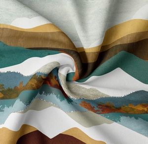 Detailed close-up of mountain landscape printed tapestry fabric texture and softness