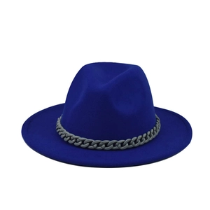 Detail of royal blue wool fedora hat featuring a stylish grey plastic chain decoration