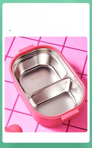Detailed view of the 304 stainless steel food-grade dual compartments of pink lunch box