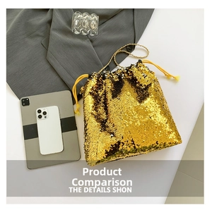 Detail of gold sequin drawstring bucket bag with sparkling texture and metallic chain