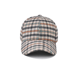 Close-up of multicolor houndstooth baseball cap featuring thick wool blend fabric
