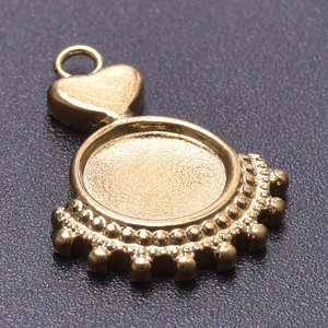 Detailed view of 18k gold plated stainless steel heart charm with round bezel tray base
