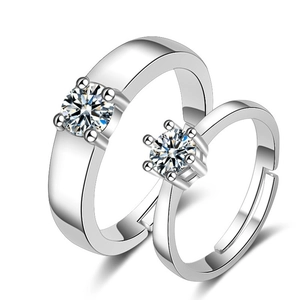 Elegant adjustable couple rings set in silver metal with sparkling zircon crown stones