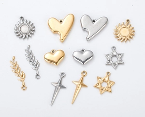 Gold and silver stainless steel charms featuring sun, heart, and star shapes for DIY jewelry