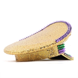 Detail of captain hat featuring gold sequins and colorful decorative spikes on a white background