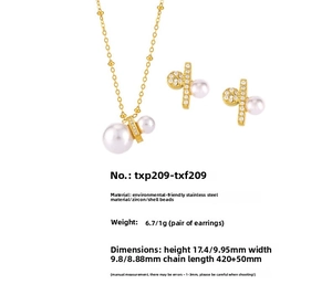 Detailed view of stainless steel jewelry set with white shell pearls and zircon stones