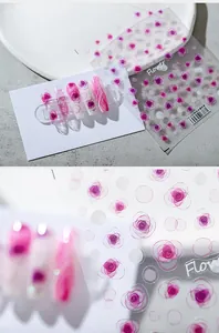 Macro view of TS-1504 pink semi-transparent rose nail stickers with hand-painted petals