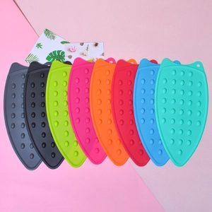 Thickened silicone iron rest pads in eight vibrant colors with non-slip heat-resistant dots