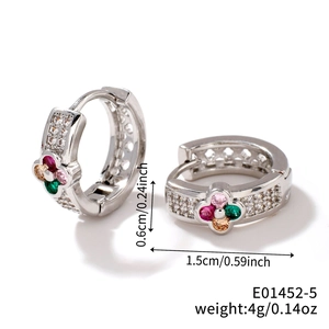 Macro view of flower earrings showing dimensions 1.5cm with colorful zirconia stones