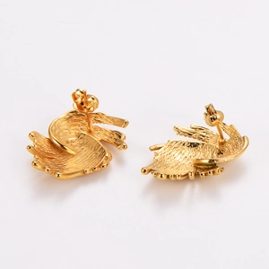 Detailed view of gold irregular swirl earrings featuring a brushed metallic texture
