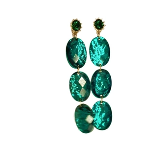 Retro geometric emerald-green drop earrings with gold-tone accents on a white background