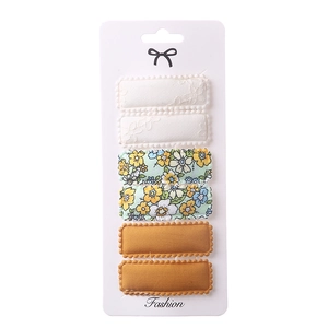Detailed set of 6 fabric snap hair clips with floral embroidery and colorful patterns