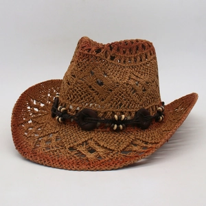 Brown woven hollow straw cowboy hat with wooden beads and bohemian wide brim for travel