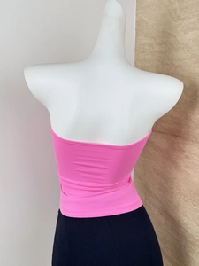 Back view of a rose pink seamless bandeau top showing open back and ribbed knit fabric