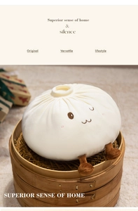 Creative white steamed bun plush pillow toy displayed in a traditional wooden steamer basket