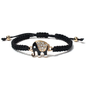 Detail of hand-woven black cord bracelet with crystal-studded golden elephant charm