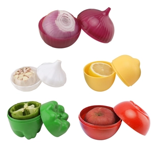 Set of five plastic fruit and vegetable shaped storage containers for kitchen food preservation