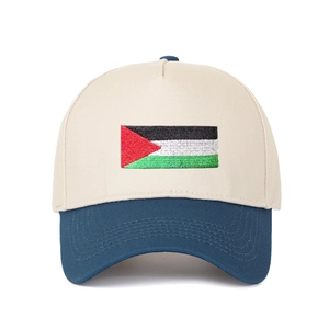 Detail of embroidered Palestine flag on a beige and navy blue two-tone baseball cap