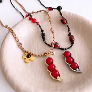 Vintage style beaded necklace with zircon flower pendant and bean pod charms for women