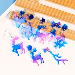 5 pairs of blue purple gradient resin deer earrings with glitter in various reindeer shapes
