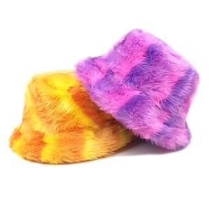 Rainbow tie-dye plush bucket hat with vibrant checkerboard pattern for winter warmth