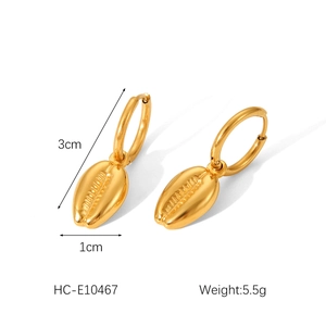 Golden seashell stud earrings detail showing 3cm length and 1cm width dimensions