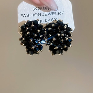 Detailed view of irregular black crystal beaded earrings with S925 silver needles