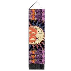Bohemian sun and moon mandala tapestry with orange floral patterns and black tassels