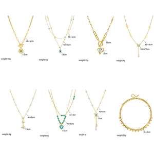 Layered gold necklaces with pearls, butterfly charms and crystal pendants in 8 styles
