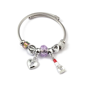 Detail of silver cable bangle with purple crystal beads, heart lock and lipstick charm