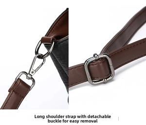 Detail of adjustable leather shoulder strap with dark nickel lobster clasp for women handbag