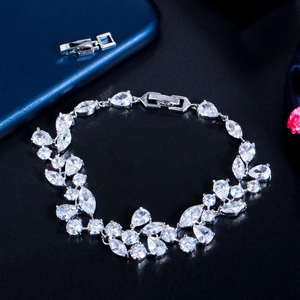 Elegant silver bracelet with leaf-shaped sparkling zircon stones for bridal wedding jewelry
