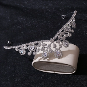 Silver bridal crown featuring pear-shaped cubic zirconia in a wavy aesthetic design