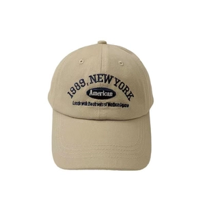 Vintage khaki cotton baseball cap with blue 1989 New York embroidery in retro American style
