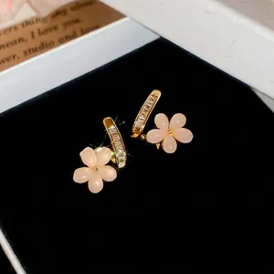 Elegant 18k gold plated flower stud earrings with pink petals and sparkling cubic zirconia