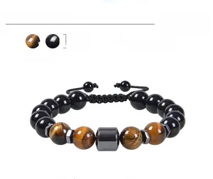 Detail of 10mm tiger eye and obsidian beaded bracelet with adjustable cord and weight info